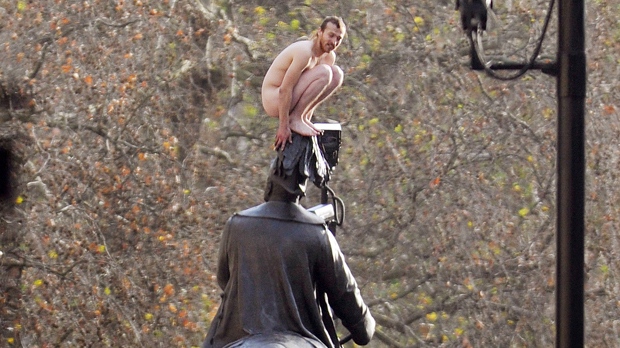 Naked mans statue stand-off ends safely