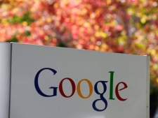 In this photo taken Friday, Oct. 8, 2010, a sign at Google headquarters in Mountain View, Calif. is shown. Google Inc.'s third-quarter earnings climbed 32 percent to beat Wall Street's expectations as companies spent more to advertise to Web surfers. (AP Photo/Paul Sakuma)