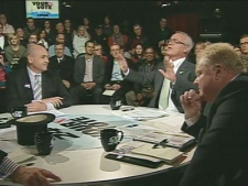 The top three candidates for Toronto mayor interact during CP24's final official debate on Tuesday, Oct. 19, 2010.
