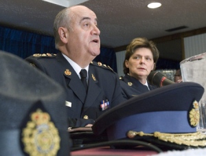 Niagara Regional Police Chief Wendy Southall, right, looks on as OPP Commissioner Julian Fantino speaks during a news conference in Toronto on Tuesday, Feb. 12, 2008. (Frank Gunn / THE CANADIAN PRESS)