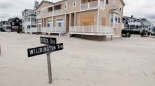 Sandy superstorm New Jersey damage sand