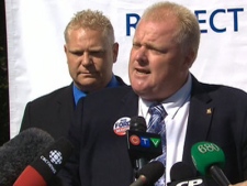 Doug Ford, left, is seen at a campaign announcement with his brother Rob Ford on Monday, Sept. 20, 2010.
