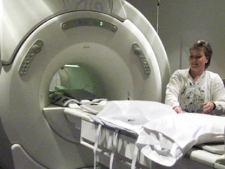 Technician Ina Matson prepares an MRI machine for use at a private clinic in Calgary, Thursday November 28, 2002. (CP PHOTO/Adrian Wyld)