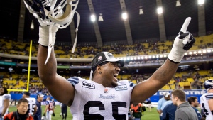 Toronto Argonauts Tony Washington celebrates his team's victory over the Montreal Alouettes in the CFL Eastern Final Sunday, November 18, 2012 in Montreal. The Argonauts beat the Alouettes 27-20 to move on the the CFL Grey Cup Final. (Paul Chiasson/ THE CANADIAN PRESS)