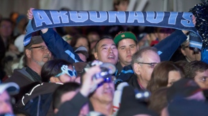 Toronto Argonauts fans cheer at a pep rally in Toronto on Tuesday, Nov. 20, 2012. (The Canadian Press/Frank Gunn)
