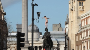 London Whitehall standoff naked man top statue