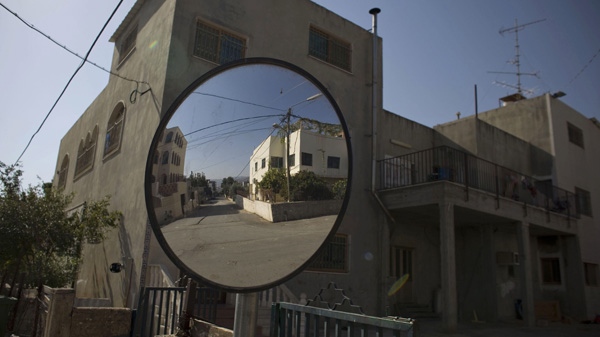 A mirror reflects an empty street in the village of Ghajar between northern Israel and Lebanon, Wednesday, Nov. 10, 2010.(AP Photo/Tara Todras-Whitehill)