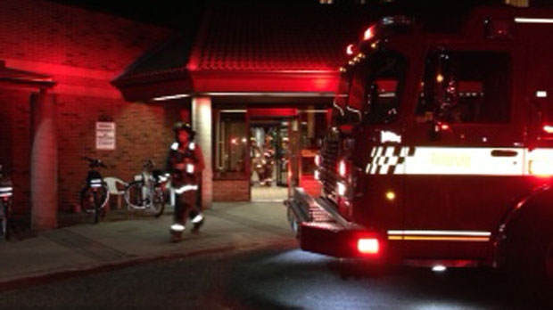 Firefighters are seen at a senior's home on West Lodge Avenue following a two-alarm fire on Wednesday, Dec. 12, 2012. (CP24/Jackie Crandles) 