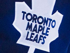 A published report suggests Rogers Communications is in talks to buy the Toronto Maple Leafs in a deal worth more than $1 billion. Citing anonymous sources, the Toronto Star reports the sale would include the NBA's Toronto Raptors, Toronto FC of Major League Soccer and the Marlies, the Maple Leafs' American Hockey League minor hockey team. (THE CANADIAN PRESS/Nathan Denette)