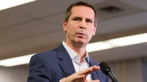 Ontario Premier Dalton McGuinty speaks to reporters at St. Fidelis Catholic Elementary School in Toronto on Thursday, Dec. 20, 2012. (The Canadian Press/Chris Young)