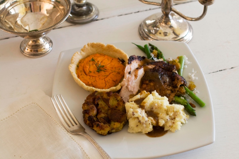 A gourmet holiday turkey dinner is shown in this October 2012 file photo. (AP Photo/Matthew Mead)