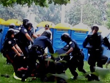 Video images released on Dec. 7, 2010 show the arrest of Adam Nobody during a G20 summit demonstration on June 26, 2010.