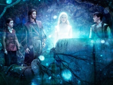 In this film publicity image released by 20th Century Fox, from left, Georgie Henley, Ben Barnes, Laura Brent, and Skandar Keynes are shown in a scene from, 'The Chronicles of Narnia: The Voyage of the Dawn Treader.