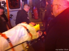 A photograph of the 'Spider-Man' actor being transported to an ambulance outside the Foxwoods Theater. (John Matthews / onlocationvacations.com)