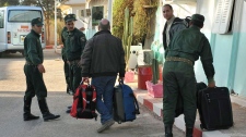 Algeria hostages going home 