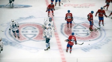 Players from the Montreal Canadiens and Toronto Ma