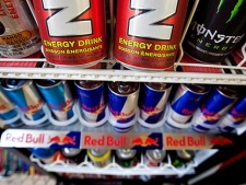 Energy drinks are shown in a store on Monday July 26, 2010 in Montreal. The Canadian Medical Association Journal is voicing alarm over the increasing popularity of highly caffeinated energy drinks among kids and teens. (THE CANADIAN PRESS/Paul Chiasson)