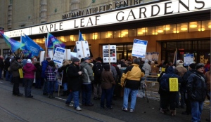 Protesters are shown outside Maple Leaf Gardens, where Ontario Liberals are choosing a new leader today. (Kyle Surowicz/CP24.com)