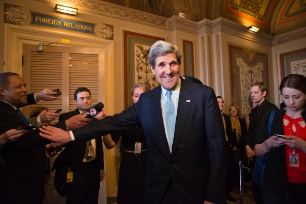 Senate panel approves John Kerry to succeed Clinto