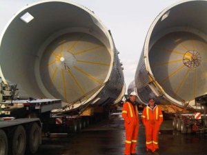 Giant beer vats are seen in Hamilton harbour before they are moved to a Molson Coors brewery in northwest Toronto on Friday, Jan. 7, 2010. (CTV News / Corey Baird)
