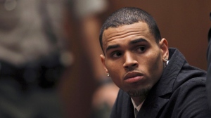In this Feb. 6, 2013, file photo, singer Chris Brown appears in court for a probation revocation hearing at the Criminal Justice Center in downtown Los Angeles. (AP Photo/David McNew)
