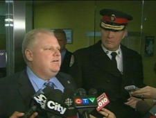 Mayor Rob Ford emerges from a meeting with Police Chief Bill Blair on Jan. 10, 2011. The two men discussed the Police Services Board budget. 