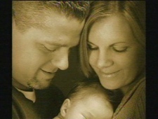 Ryan Russell, 35, his wife Christine and their son Nolan.