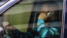 Driver talks on cellphone while driving