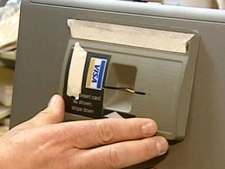 A card-skimming device that could be attached to an ATM to capture card numbers and PINs is seen in this undated image.