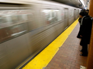 Commuters wait on a Toronto subway platform. (THE CANADIAN PRESS/J.P. Moczulski)