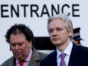 WikiLeaks founder Julian Assange, right, walks with his lawyer Mark Stephens as they leave Belmarsh Magistrates' Court in London, England, on Monday, Feb. 7, 2011. (AP Photo/Matt Dunham)