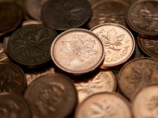 Canadian one-cent coins. (THE CANADIAN PRESS/Adrian Wyld)