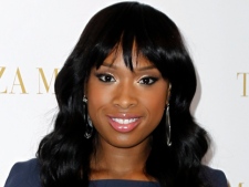 In this May 15, 2010 file photo, actress Jennifer Hudson poses during a photocall for "Winnie" in Cannes, France. During an interview on "The Oprah Winfrey Show," airing Thursday, Feb. 10, 2011, Hudson said she's still trying to make her mother proud, and that's what has kept her going since her mother and two other family members were murdered. (AP Photo/Matt Sayles)