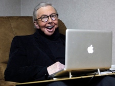 In this photo taken Wednesday, Jan. 12, 2011, film critic Roger Ebert works in his office at the WTTW-TV studios in Chicago. (AP Photo/Charles Rex Arbogast)