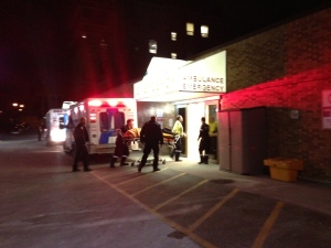 An ambulance carrying a victim from a double-shooting at Yorkdale Shopping Centre arrives at Sunnybrook hospital Saturday, March 30, 2013. (CP24/ Tom Podolec)