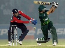 Pakistan's batsman Younis Khan, right, plays a shot as England's wicketkeeper Matt Prior, left, looks on during their World Cup warm up cricket match at the Khan Shaheb Osman Ali stadium in Fatullah, Bangladesh on Friday Feb. 18, 2011. (AP Photo/ Themba Hadebe)