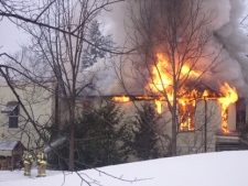 Firefighters battle a blaze at a historical building in the hamlet of Whitevale, Ont., on Thursday, Feb. 24, 2011. (Photo courtesy of Nicholas Schembri�)