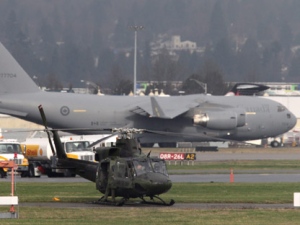A Canadian Forces C-17 Globemaster taxis for takeoff as a crew involved in security for the Vancouver Winter Olympics prepares to lift off at Vancouver International Airport in Richmond, B.C., in this Wednesday February 3, 2010, photo. (THE CANADIAN PRESS/Darryl Dyck)