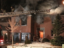 Firefighters battle a blaze in Markham on Friday, Feb. 2011. (CP24/Tom Stefanac)