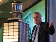 Jim Barker, coach of the Toronto Argonauts, addresses a gathering after being named 2010 CFL Coach Of The Year in Vancouver on Friday, Feb 25, 2011. (THE CANADIAN PRESS/Jonathan Hayward)