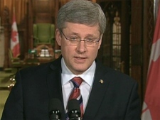 Prime Minister Stephen Harper addresses the media on Canada's response to violence in Libya on Friday, Feb. 25, 2011.