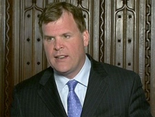 John Baird speaks at an Ottawa press conference, Monday, Feb. 28, 2011.