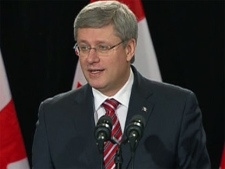 Prime Minister Stephen Harper answers questions from reporters at a press conference in Toronto on Thursday, March 3, 2011.