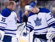 oronto Maple Leafs goaltenders James Reimer, right, and Jean-Sebastien Giguere tap each other's pads following the Maple Leafs' 5-3 loss to the Chicago Blackhawks during NHL hockey action in Toronto Saturday, March 5, 2011. THE CANADIAN PRESS/Darren Calabrese
