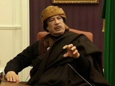 This video image taken from Turkish television Libyan leader Moammar Gadhafi is seen during an interview with the TV channel TRT, in Tripoli, Libya, Tuesday March 8, 2011. Gadhafi said in an interview broadcast Wednesday that Libyans would fight back if Western nations impose a no-fly zone to prevent the regime from using its air force to bomb government opponents staging a rebellion. (AP Photo/TRT)