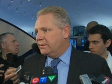Coun. Doug Ford reacts after council votes against hearing a motion calling for the resignation of the TCHC's board of governors on March 8, 2011. 