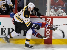Montreal Canadiens' Max Pacioretty is hit by Boston Bruins' Zdeno Chara during an NHL game Tuesday, March 8, 2011 in Montreal. (THE CANADIAN PRESS/Paul Chiasson)