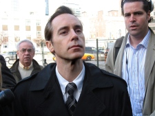 Robert Baltovich is surrounded by reporters as he waits to enter a Toronto courtroom on Wednesday, April 16, 2008. (Colin Perkel / THE CANADIAN PRESS)