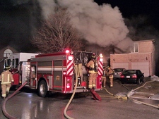 Firefighters battle a blaze in Thornhill Tuesday night. (CP24/Tom Stefanac)