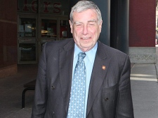Bruce Carson walk to Hy's Steakhouse in Ottawa, May 1, 2008. Harper's office called the RCMP on Wednesday March 16, 2011, after learning of the allegations against Carson, a former senior aide to the prime minister. (THE CANADIAN PRESS/ Jake Wright)